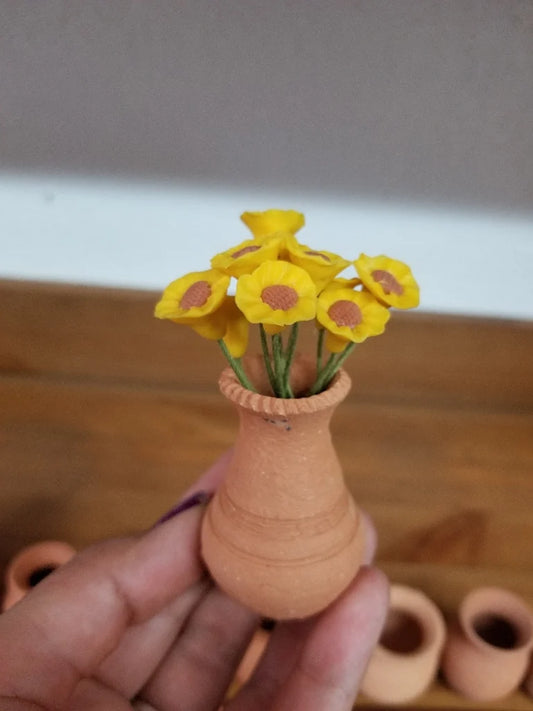 Mini florero del barro